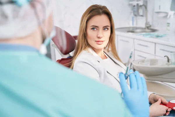 Woman having appointment with doctor in dental clinic — Stock Photo, Image