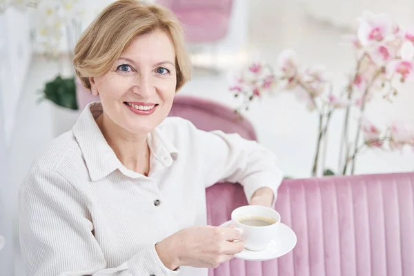 Close up of kind woman enjoying her weekend — Stock Photo, Image