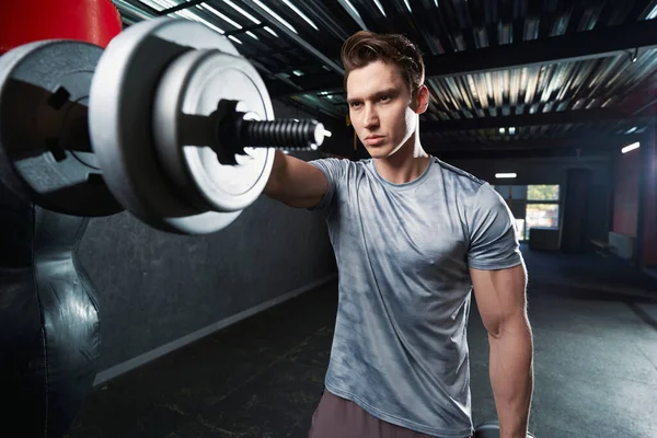 Serious Motivated Athletic Young Male Doing Dumbbell Front Raise Exercise — Stock Photo, Image
