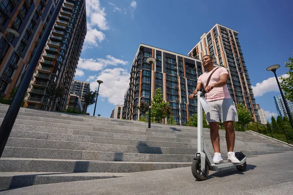 Smiling Contented Male Person Descending Concrete Stairs Business District Using — Stockfoto