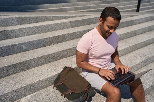 Focused Male Person Sitting Steps Typing His Portable Computer — Photo