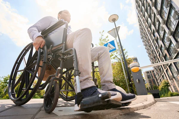 Low Angle Male Disability Going Kerb Manual Wheelchair — ストック写真