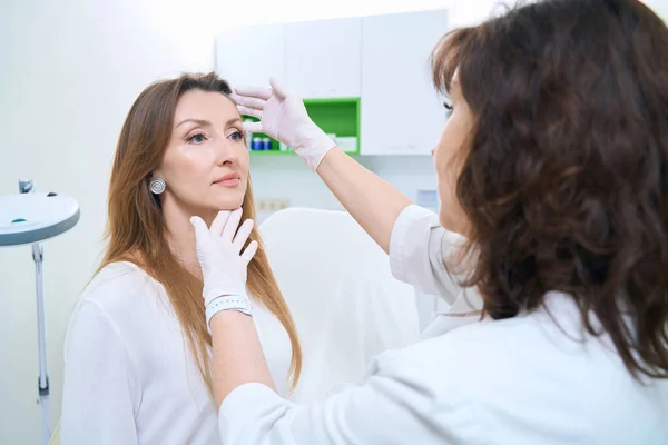 Doctor Dermatologist Gloves Carefully Examines Patient Face — Foto de Stock