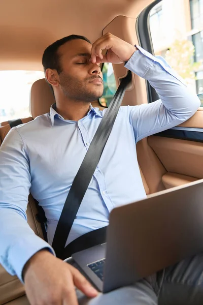 Exhausted Young Male Entrepreneur Seated Laptop Automobile Pinching Bridge His — Stockfoto