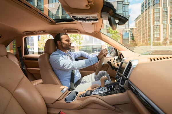 Side View Serious Focused Man Seated Steering Wheel His Car — стоковое фото