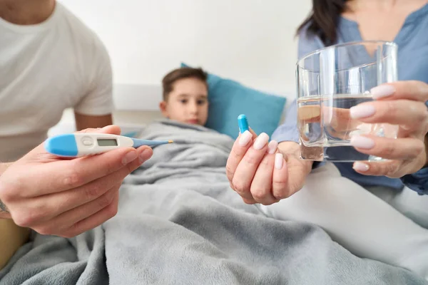 Caring Parents Take Care Son Illness Take His Temperature Give — Fotografia de Stock