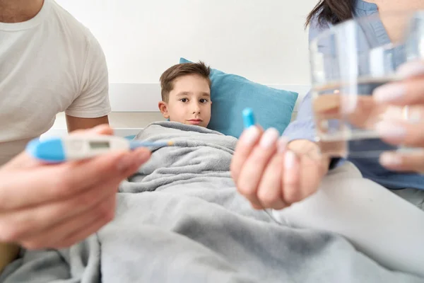 Kind Parents Take Care Sick Boy Take His Temperature Give — Stockfoto