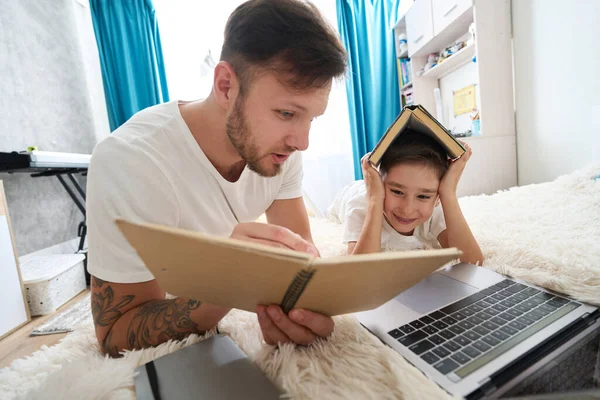 Young Father Helps His Son Correct Homework Use Laptop Books — Foto de Stock