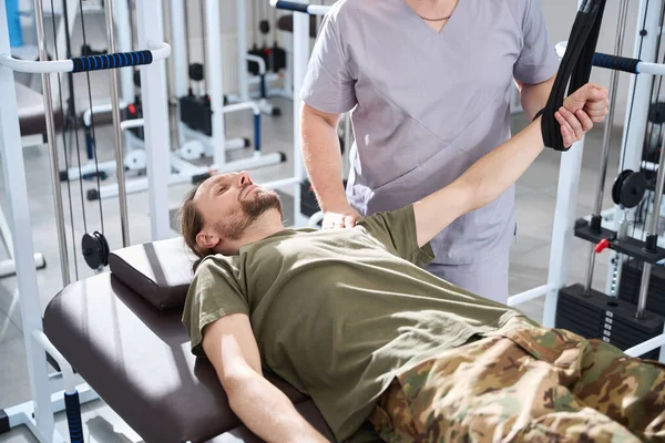 Physiotherapist Works Patient Arm Simulator Military Hospital Fighter Lies Special — Fotografia de Stock