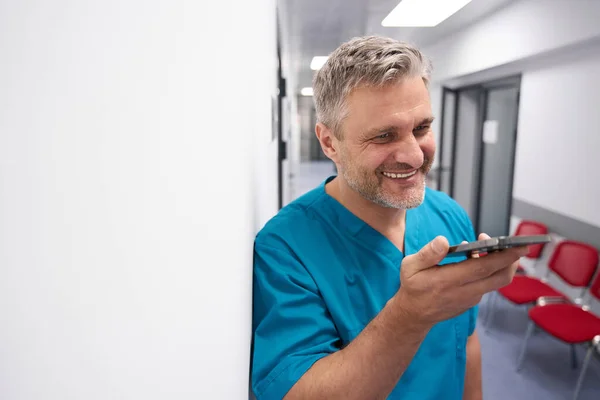 Doctor Speaks Phone Hallway Smiles — Foto Stock