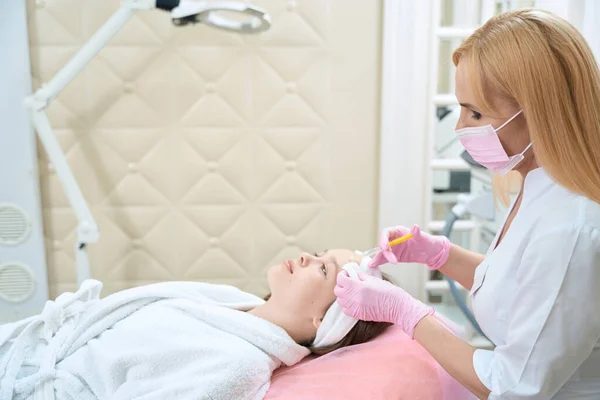 Woman Beautician Pink Mask Gloves Makes Injection Girl Chair Acne — Stock Photo, Image