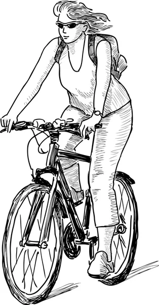 Fille sur un vélo — Image vectorielle