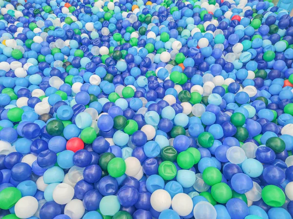 Plastic balls in a children\'s pool. ball pool. recreation and leisure area. children\'s playground. children\'s toy
