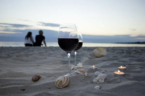 Romantic evening with glass of wine — Stock Photo, Image