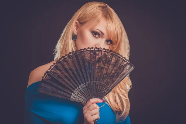 Woman with fan — Stock Photo, Image