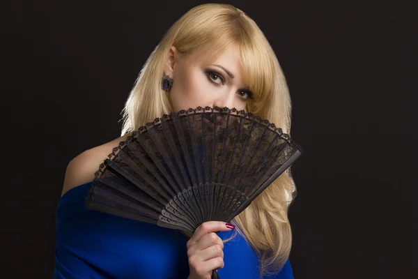 Woman with fan — Stock Photo, Image