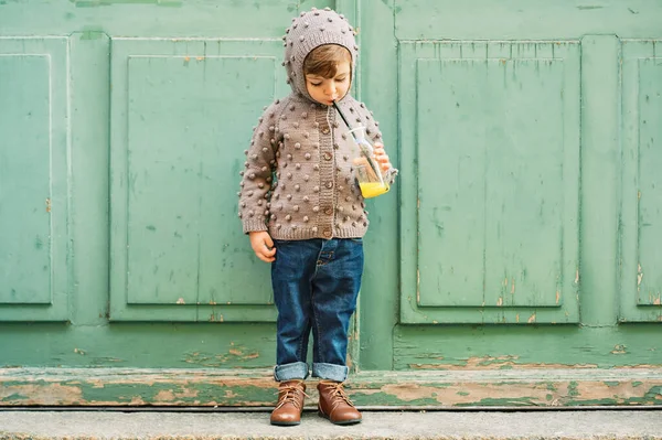 Outdoor Portrait Cute Toddler Girl Wearing Brown Knitted Jacket Drinking — Stock Photo, Image
