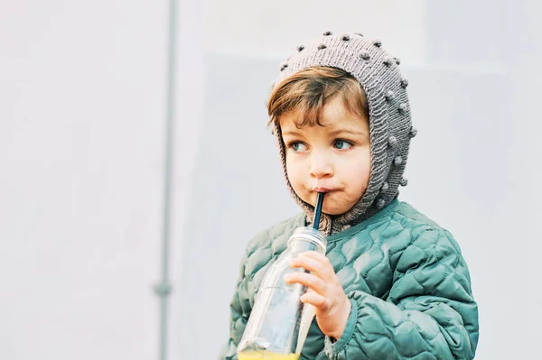 Outdoor Portrait Cute Little Girl Drinking Juice Bottle Wearing Warm — Stock Photo, Image