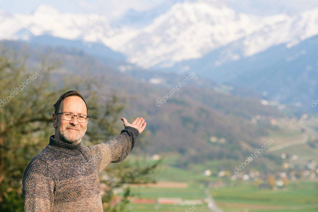 Middle age man enjoying mountain hike on a nice sunny day, image taken in Valais, Switzerland