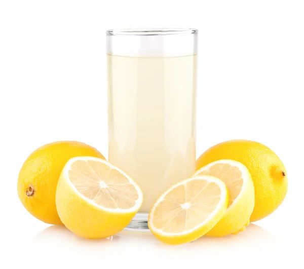 Glass of lemon juice with lemons — Stock Photo, Image