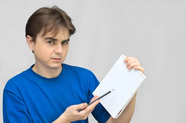 Man presents project on paper — Stock Photo, Image