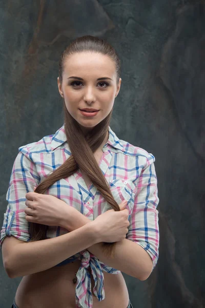 Woman half length on dark background — Stock Photo, Image