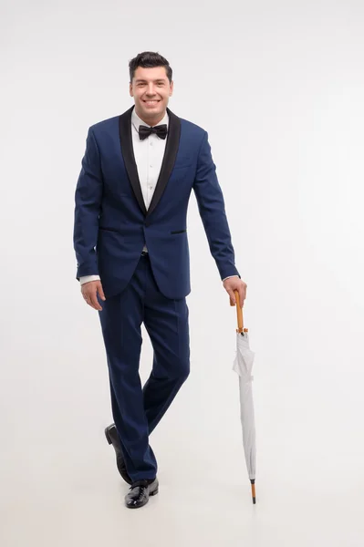 Fashion man with stick umbrella — Stock Photo, Image