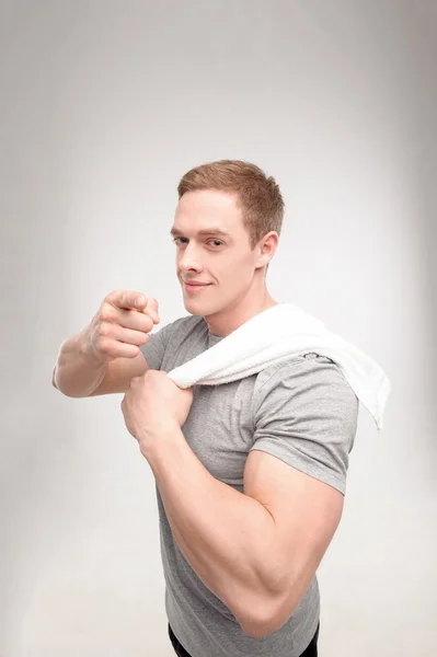 Man after workout with towel — Stock Photo, Image