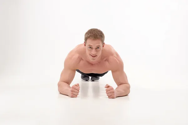 Guy making push ups exercise — Stock Photo, Image