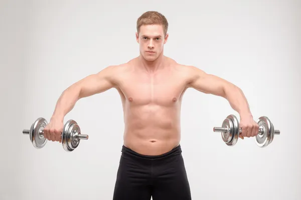 Abdominals with dumbbells — Stock Photo, Image