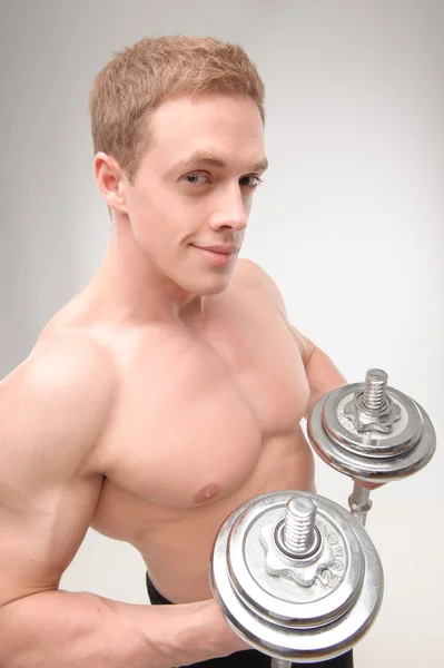Abdominals with dumbbells — Stock Photo, Image