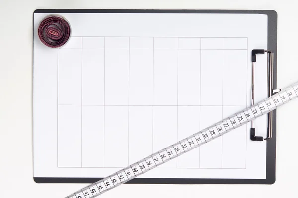 Clipboard and  measuring tape — Stock Photo, Image