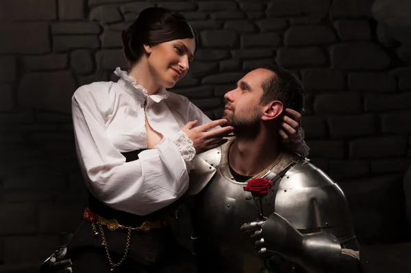Knight giving a rose to lady — Stock Photo, Image