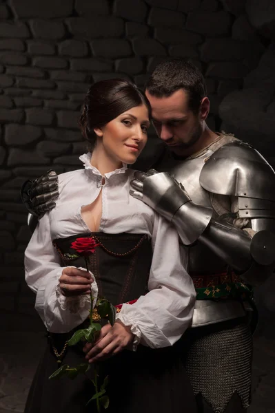 Knight giving a rose to lady — Stock Photo, Image