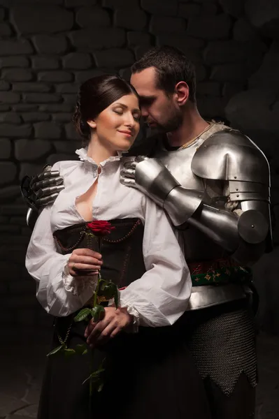 Knight giving a rose to lady — Stock Photo, Image