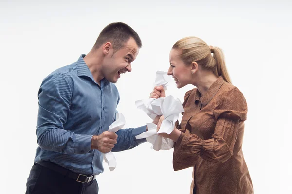 Colleagues fighting each other with paper in fists — Stock Photo, Image