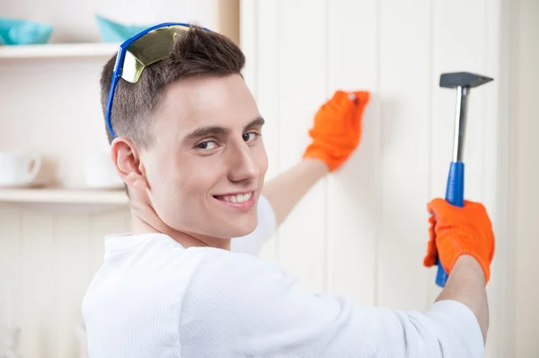 Young man with Hammer — Stock Photo, Image