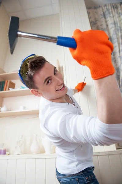 Young man with Hammer — Stock Photo, Image