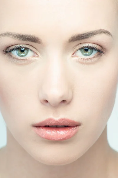 Closeup portrait of young beautiful green eyed woman — Stock Photo, Image