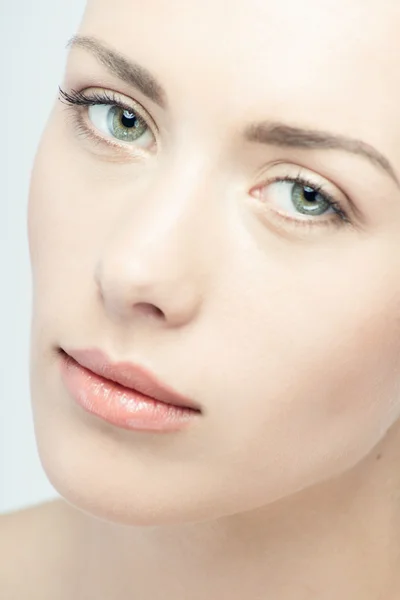 Closeup portrait of young beautiful green eyed woman — Stock Photo, Image