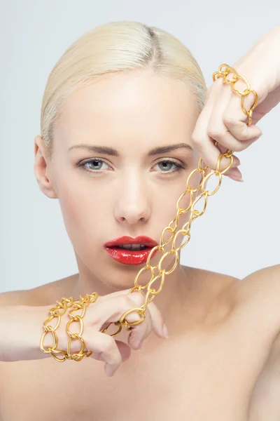 Young beautiful woman with neck chain — Stock Photo, Image