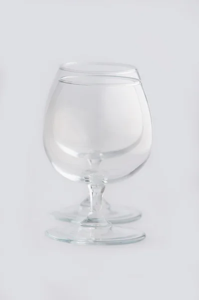 Jeden prázdný brandy sklo — Stock fotografie