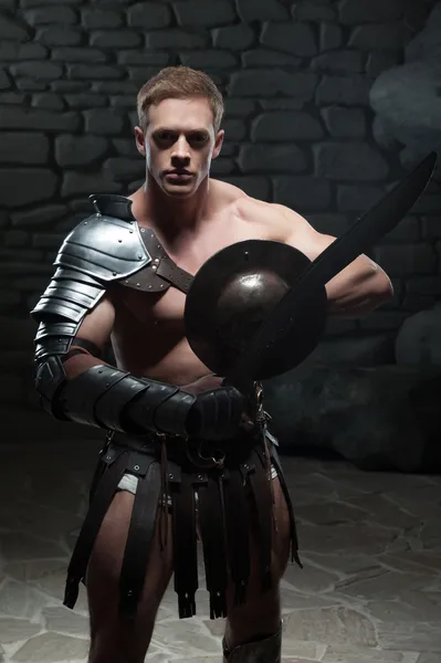 Gladiator with shield and sword — Stock Photo, Image