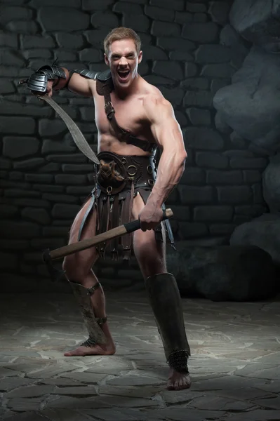 Gladiator with two swords — Stock Photo, Image