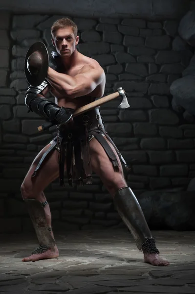 Gladiator with shield and axe — Stock Photo, Image