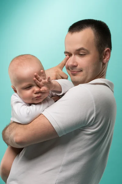 Father holding his baby boy — Stock Photo, Image