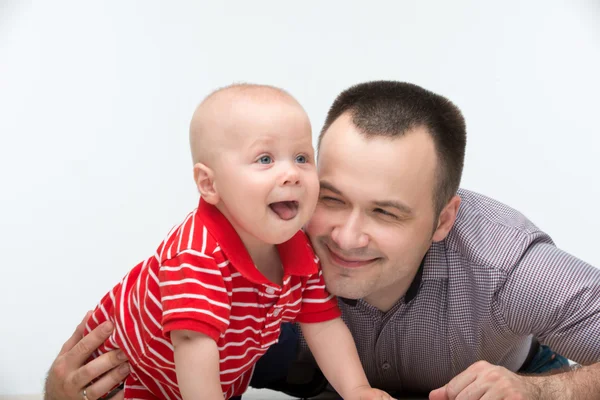 Father embracing his cute toddler son — Stock Photo, Image