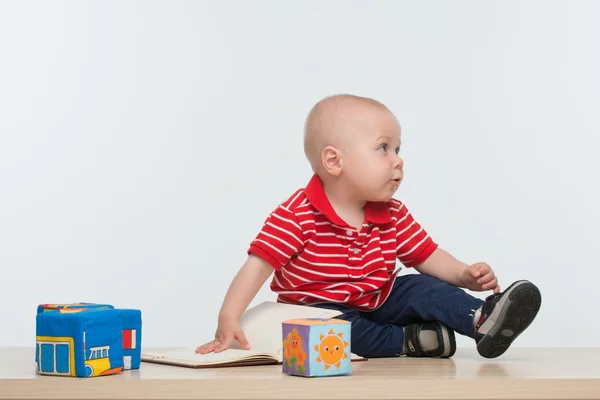 Cute kid with a book — Stock Photo, Image