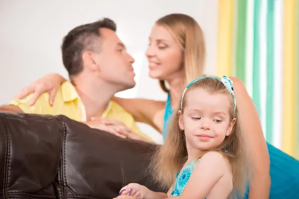 Cute little girl having fun with parents — Stock Photo, Image