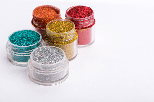 Close-up view of  powder eyeshadows  in different colours isolat
